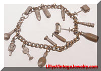 Vintage Silver tone This and That Charm Bracelet