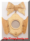 Miriam Haskell etched golden locket brooch