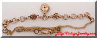 Vintage Pink Rhinestones Golden Love Knots Necklace