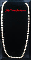 Vintage Long faux Pearls Knotted necklace